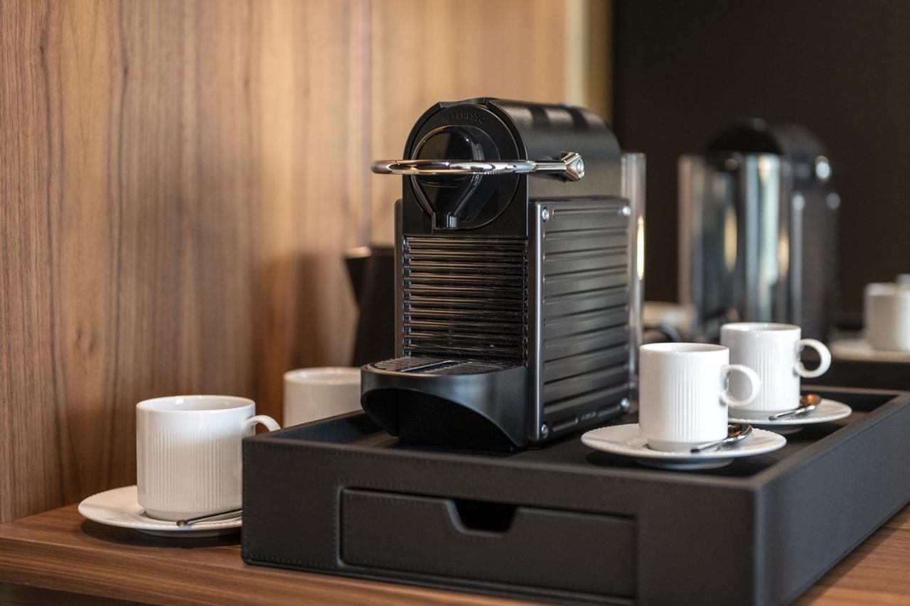 Renaissance Porto Lapa Hotel Exteriér fotografie A Nespresso coffee machine